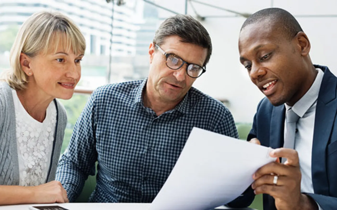 people reviewing documents