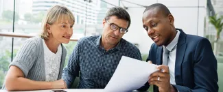 people reviewing documents
